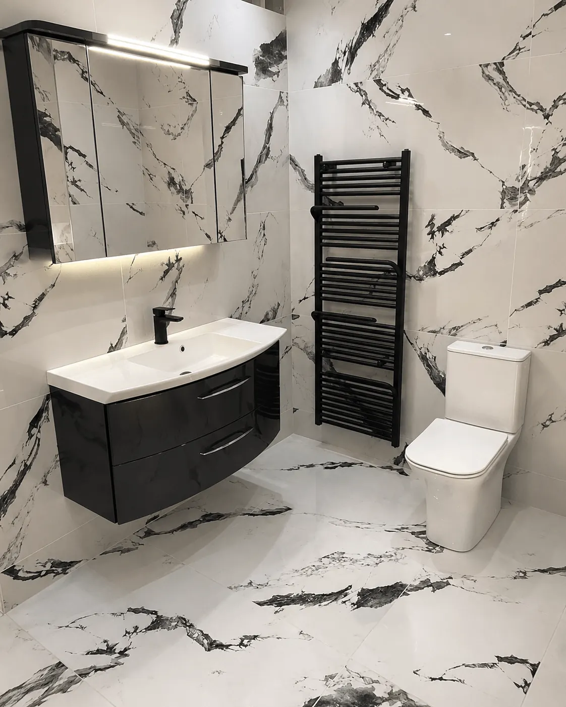 Bathroom with bold marble-effect tiles, curved black vanity and black towel radiator