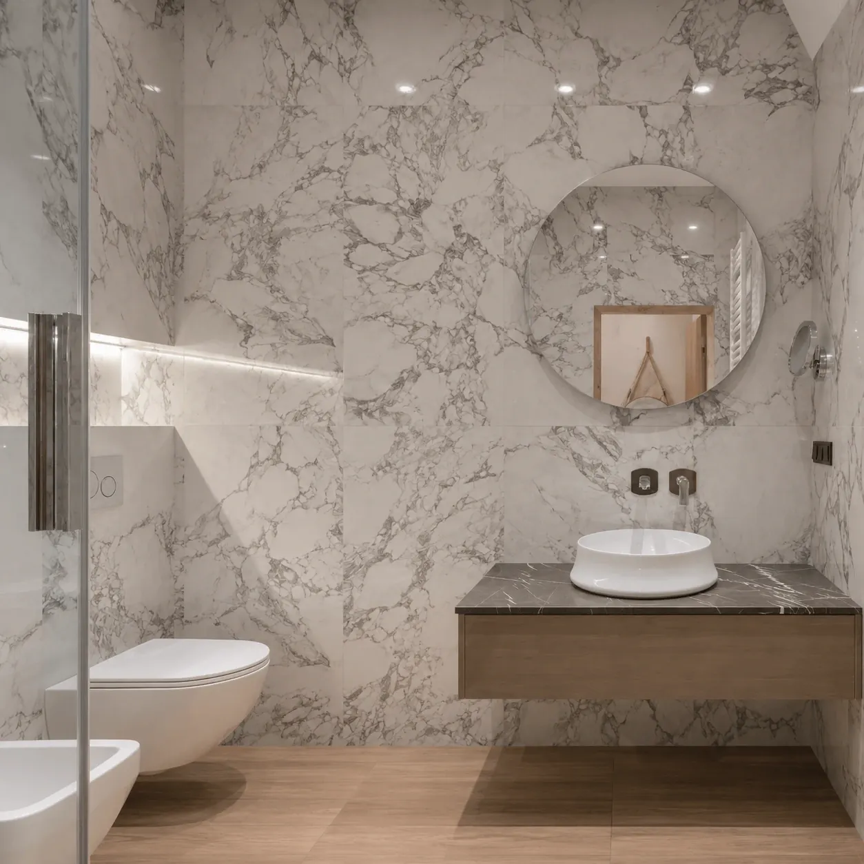 Marble-effect bathroom with a wall-mounted vanity and round countertop basin