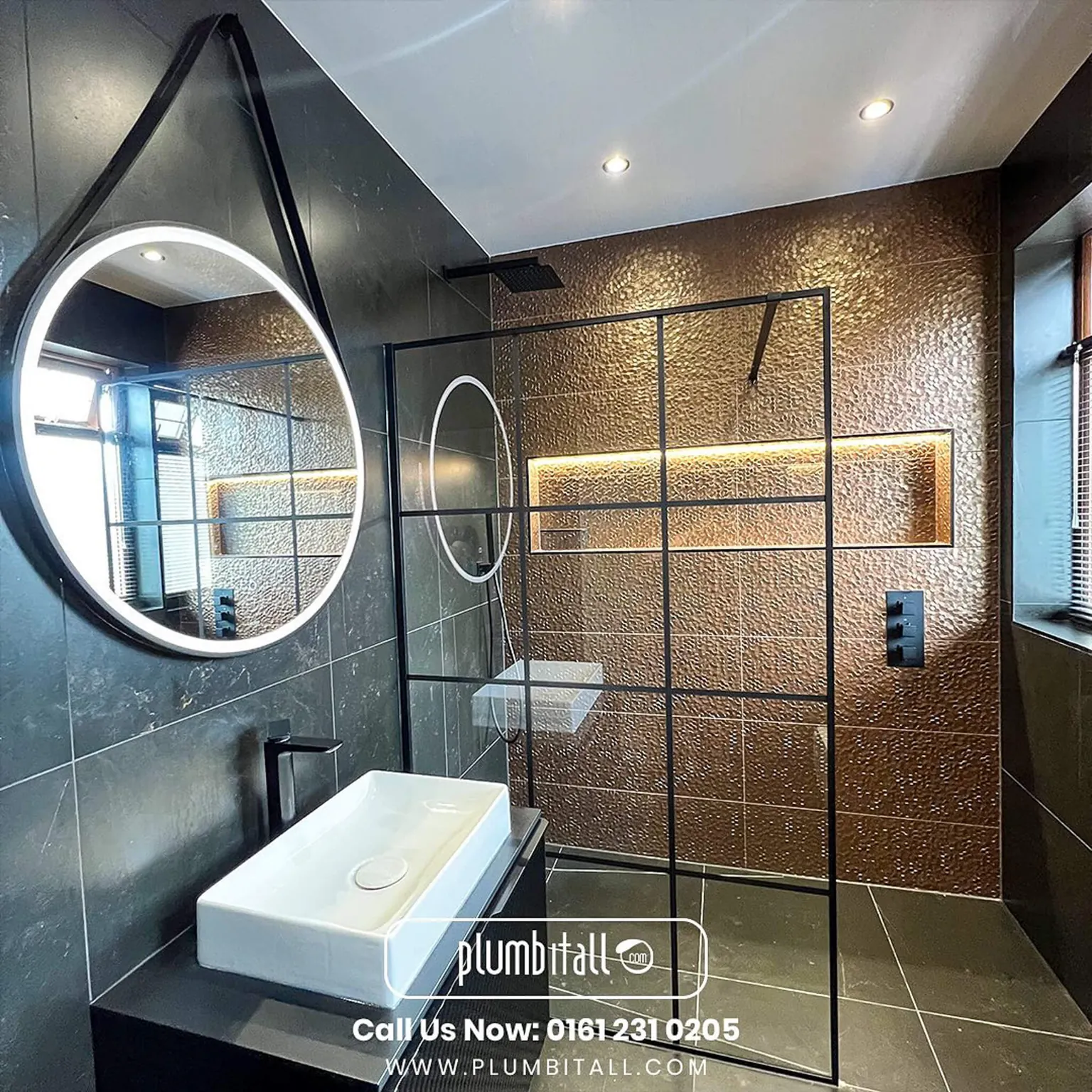 Wet room with a bronze feature wall and illuminated shower storage recess
